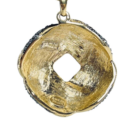 Nolan Miller Gold Tone Rope Chain Necklace With Love Knot Crystal Pendant (6006) - Picture 3 of 6